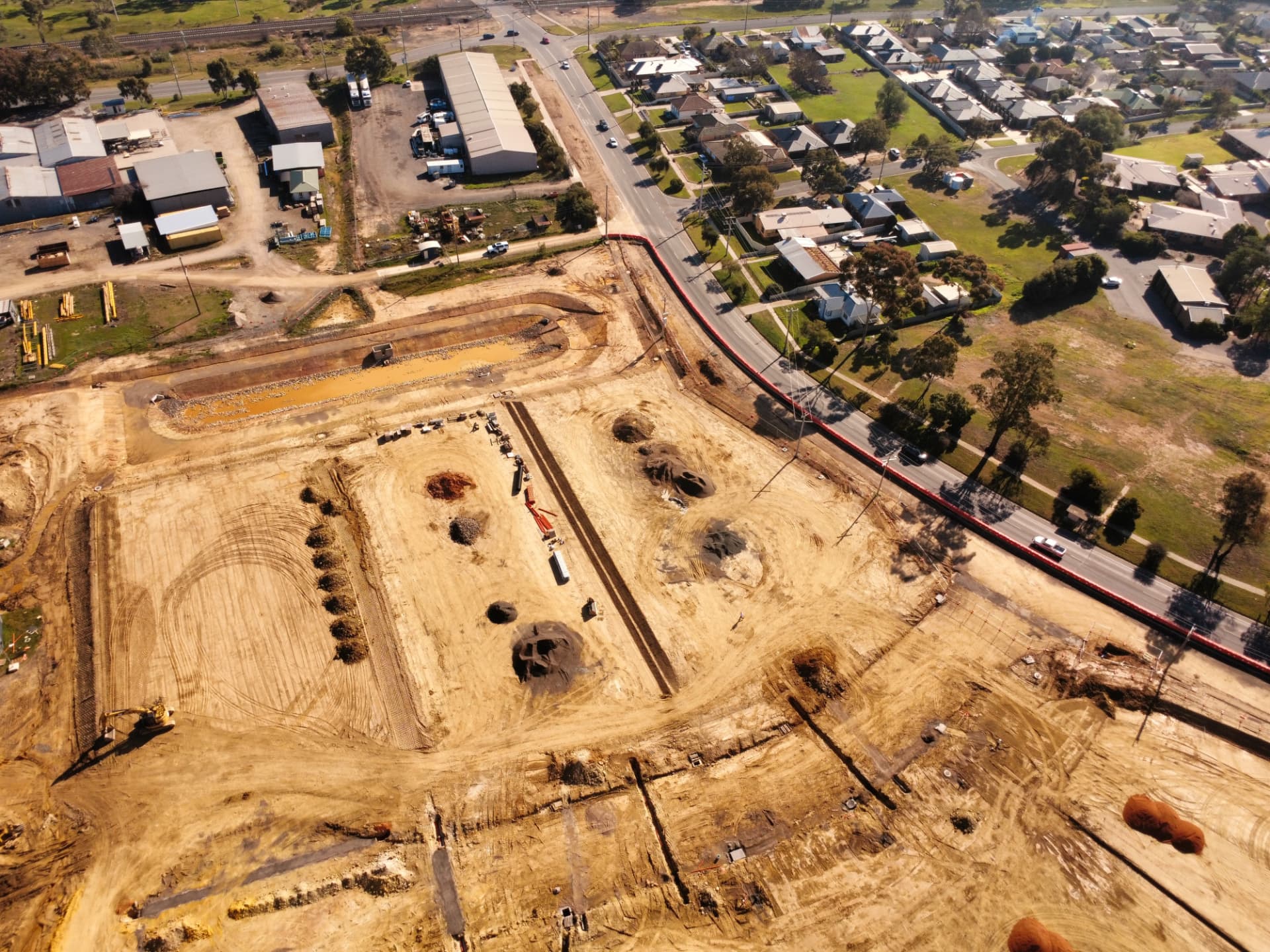 Aerial view of Terra Vista Stage 1 earthworks showing the internal court, drainage reserve and lot pads under construction